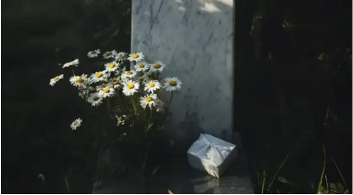 I Was Late to My Grandmom's Funeral—When I Finally Got to Her Grave, There Was a Small Package with My Name on It