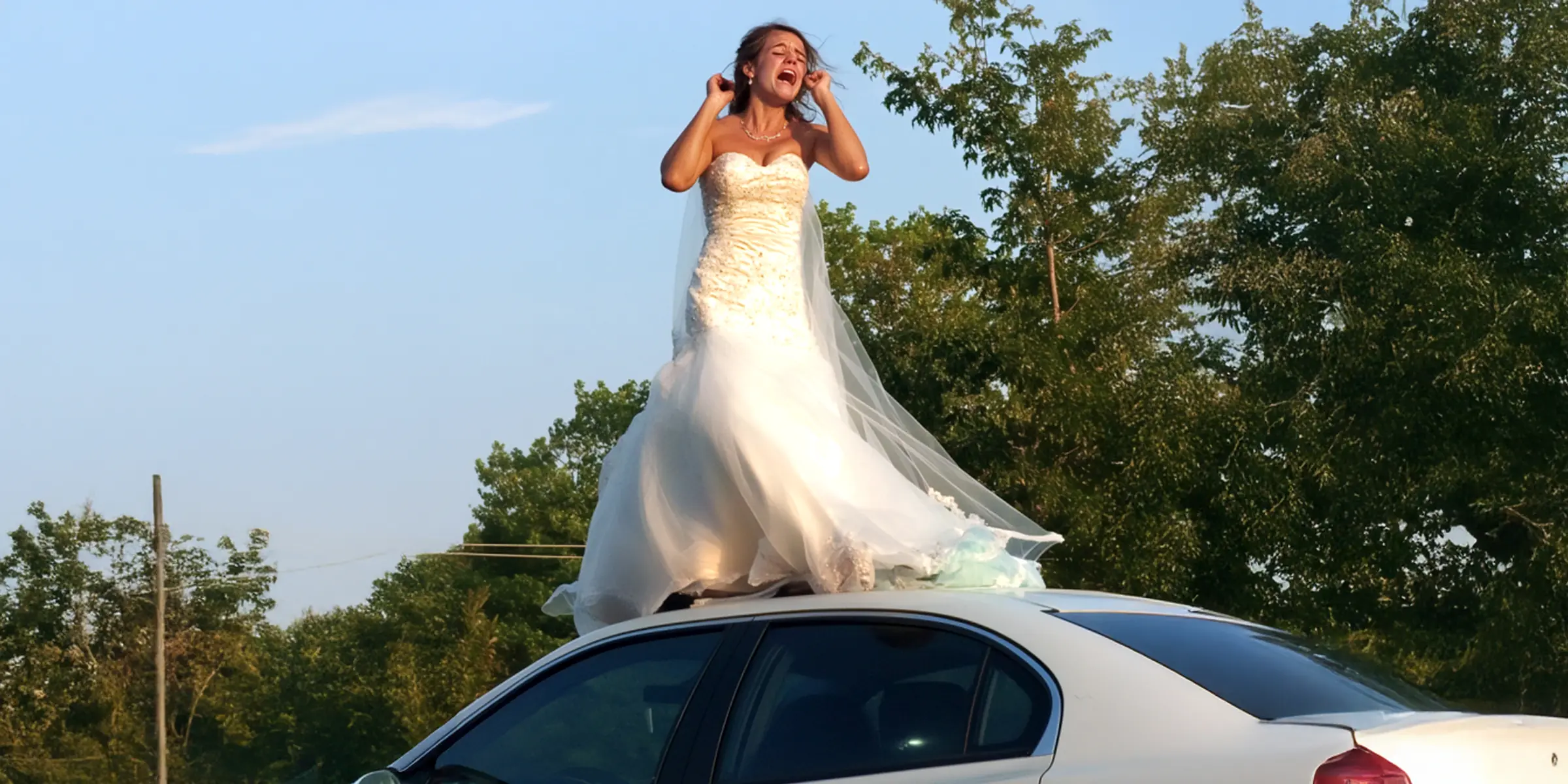 I Stepped Outside One Morning and Saw a Woman in a Wedding Dress on My Husband's Car Roof