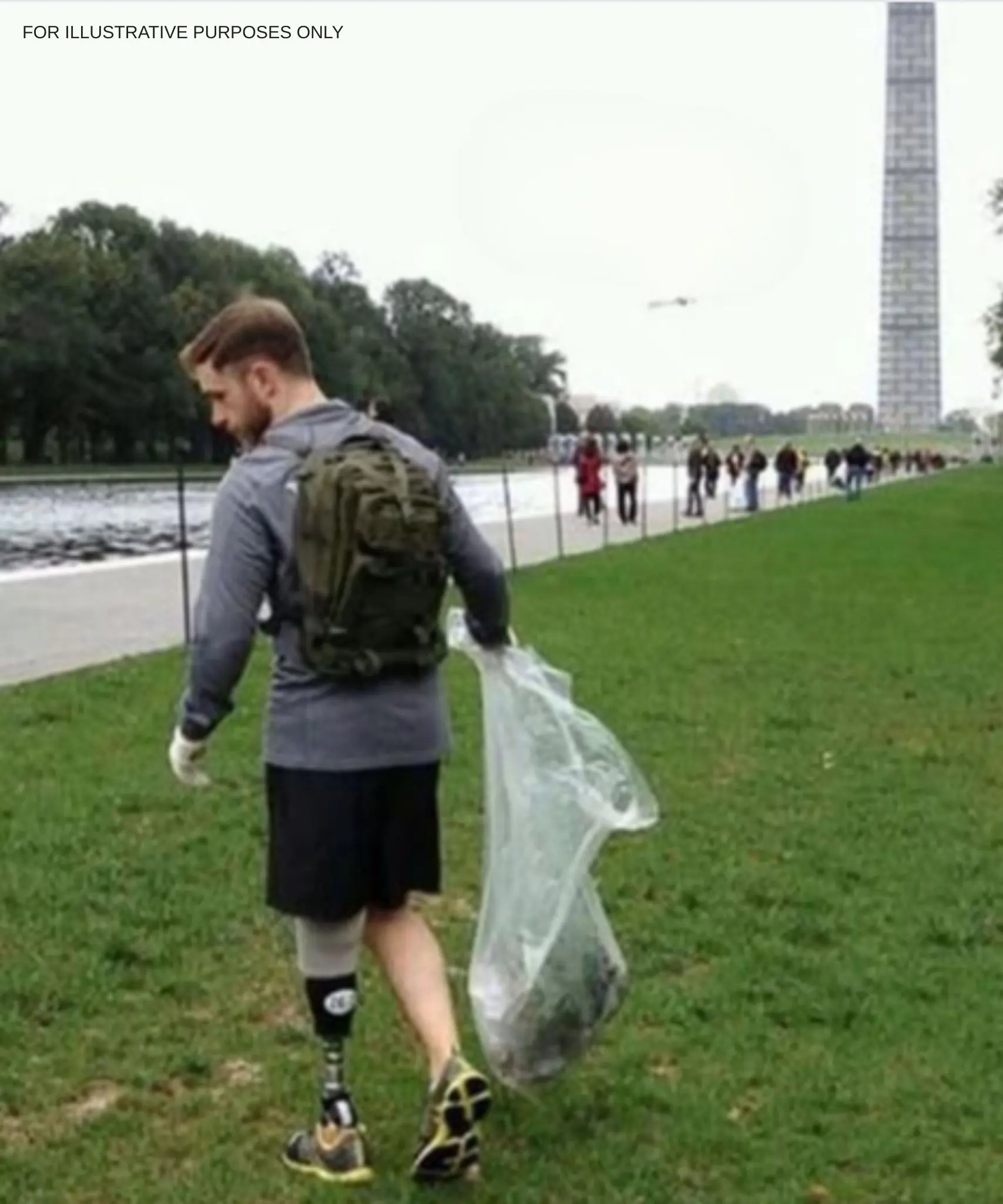 A wounded veteran picks up trash, as people whisper behind me.