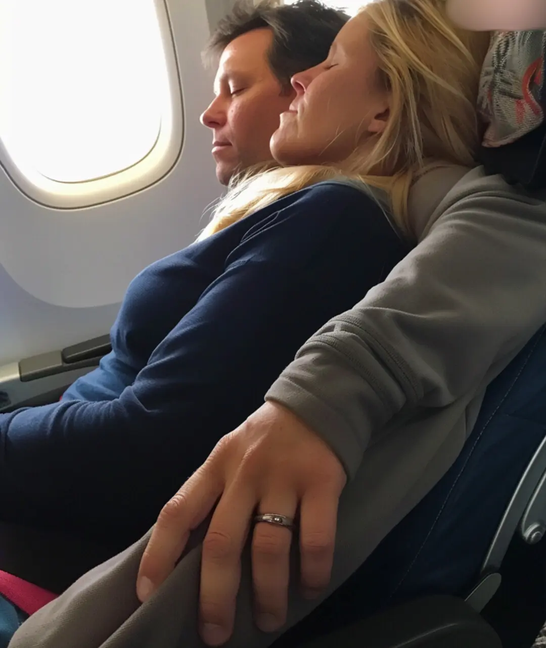 I FELL ASLEEP ON MY HUSBAND'S SHOULDER IN THE PLANE BUT WOKE UP ON THE SHOULDER OF ANOTHER MAN.