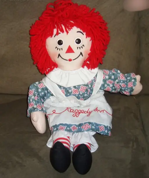 Poor Janitor Buys Old Doll at Flea Market, Gives it to Child & Hears Crackling Sound from It