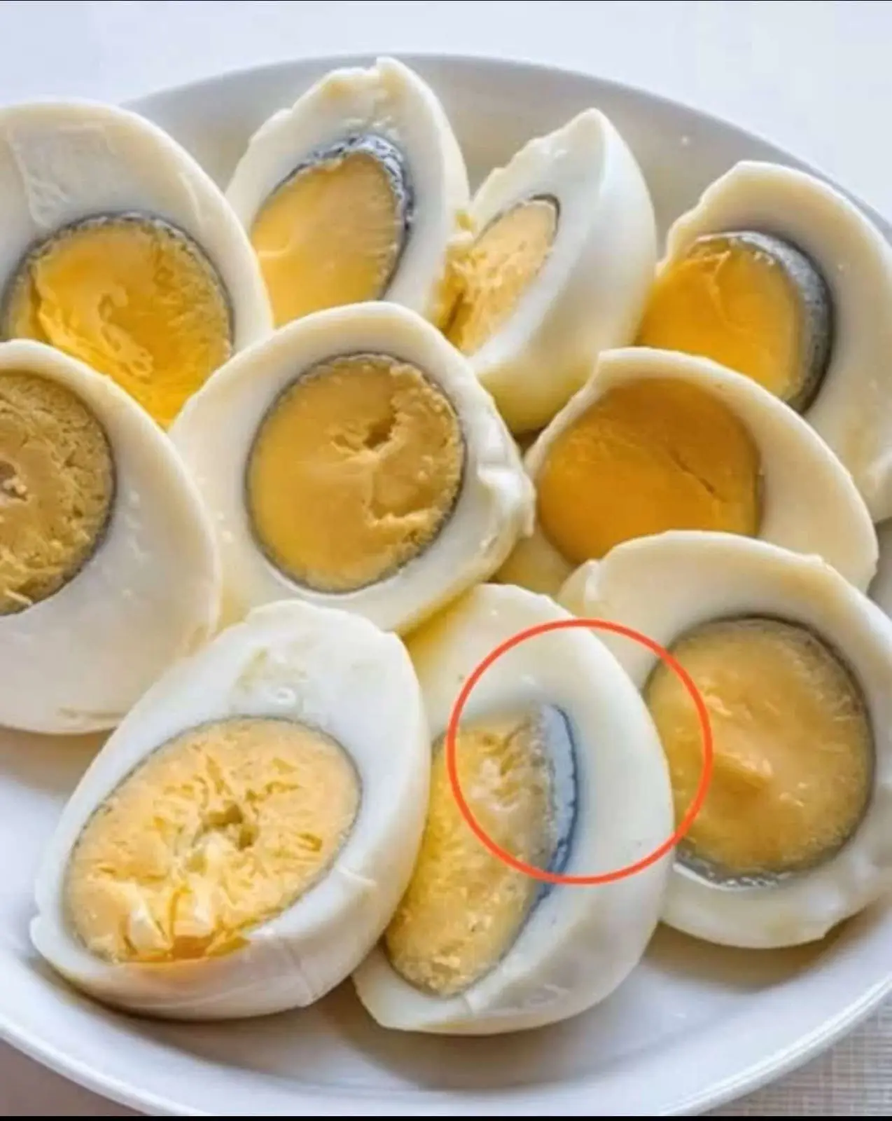 What causes the green ring around hard-boiled eggs?
