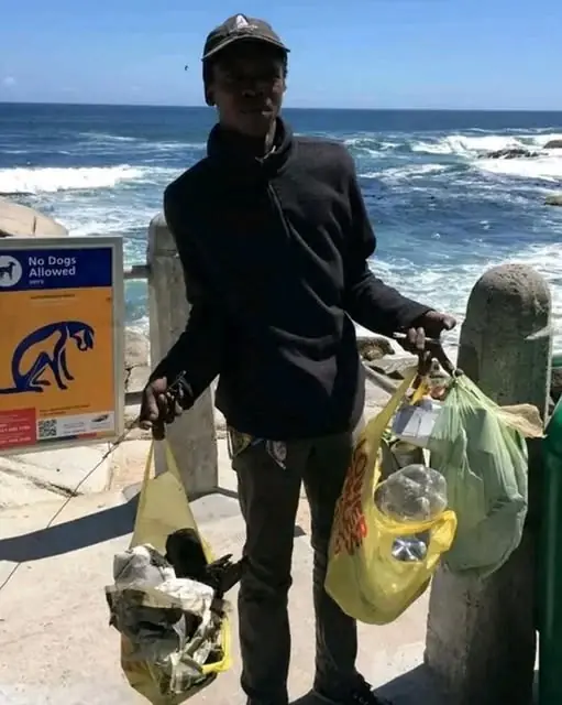 The Man Who Cleaned the Beach for Free — And Changed His Life Doing It.