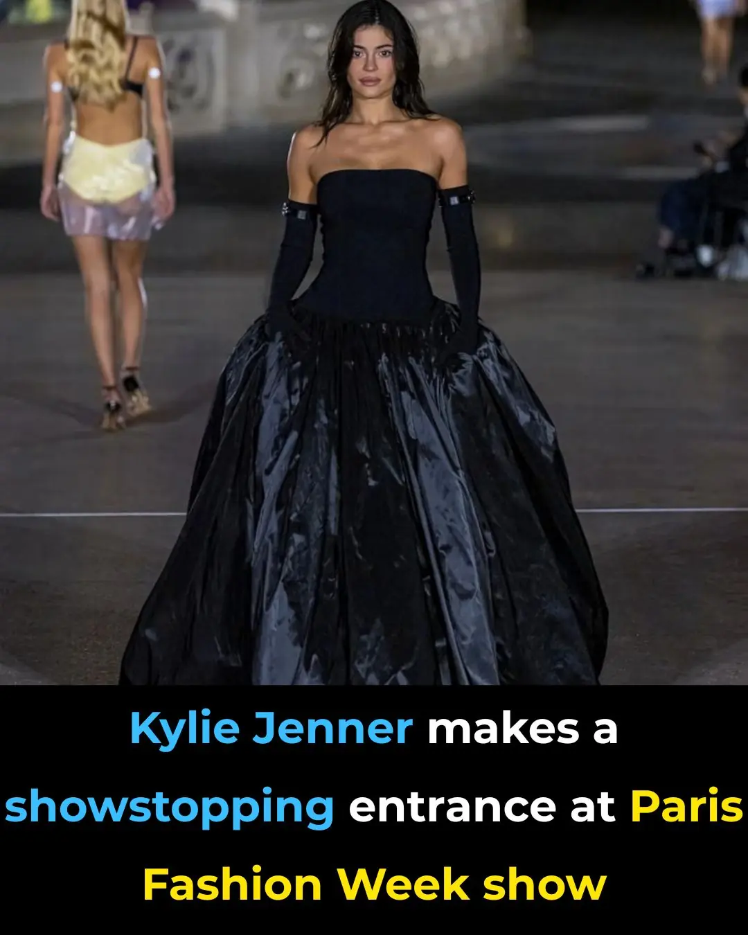 Kylie Jenner flaunts her curves in a plunging sheer black lace dress as she makes a showstopping entrance for Paris Fashion Week's Miu Miu show
