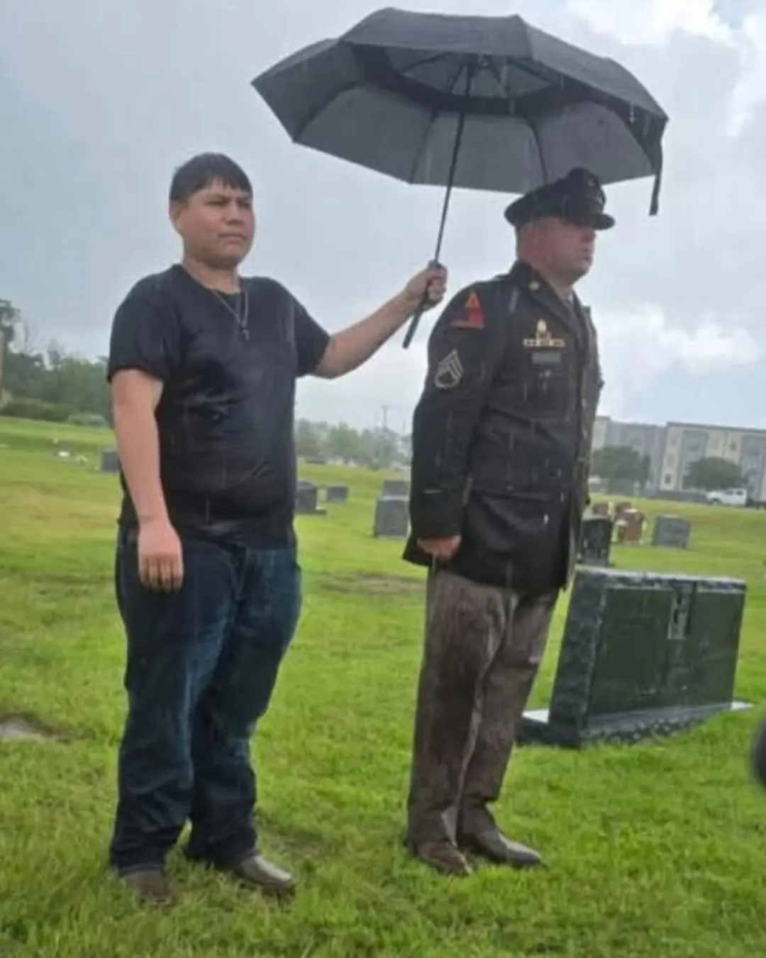 A Boy, a Soldier, and an Umbrella: A Timeless Gesture of Respect
