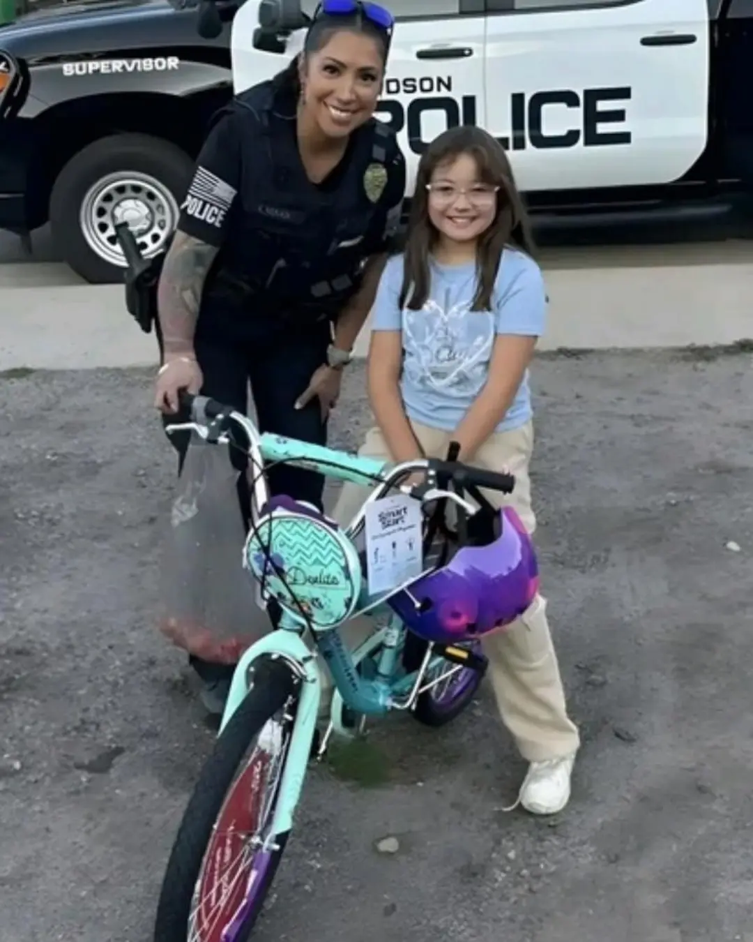 Hudson Officers Surprise 7-Year-Old Girl With a New Birthday Bike.