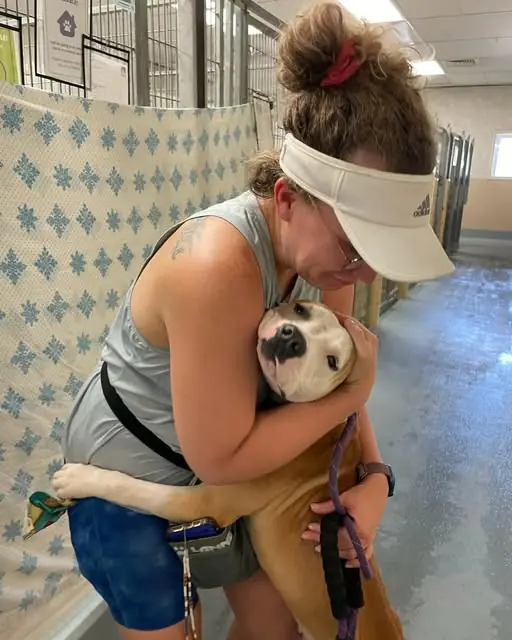 The Power of a Hug: How One "Code Red" Dog Embraced His Way to a Second Chance