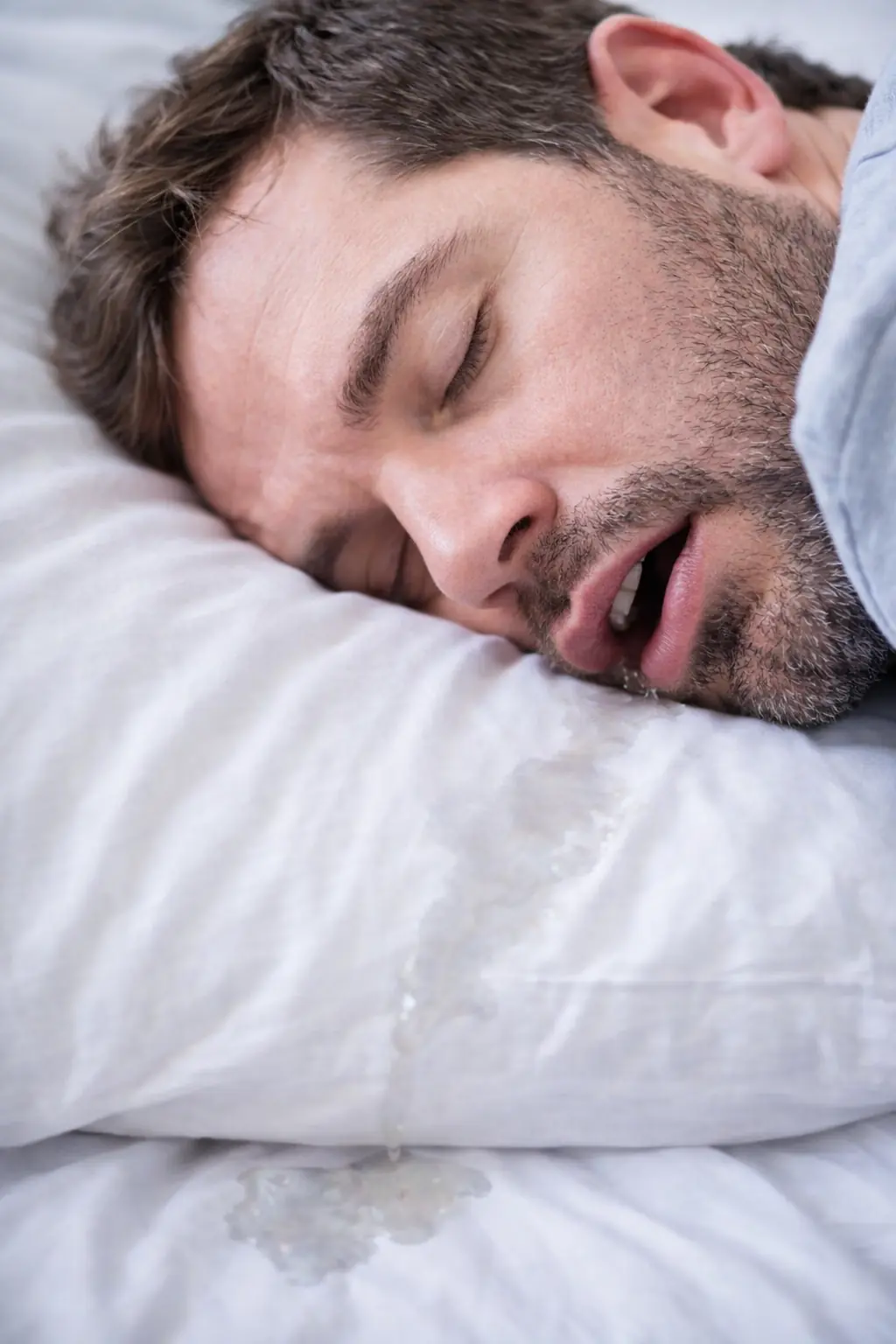 Waking Up to a Wet Pillow? 6 Potential Health Risks Behind Frequent Sleep Drooling