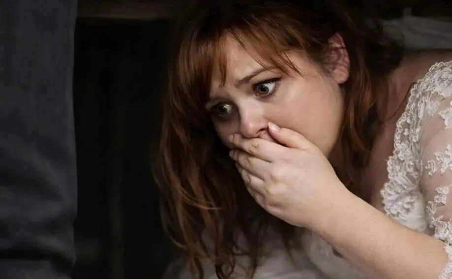 On our wedding night, I decided to play a prank on my husband and hid under the bed to surprise him. But when the door opened, it wasn’t my husband who walked into the room — it was a stranger
