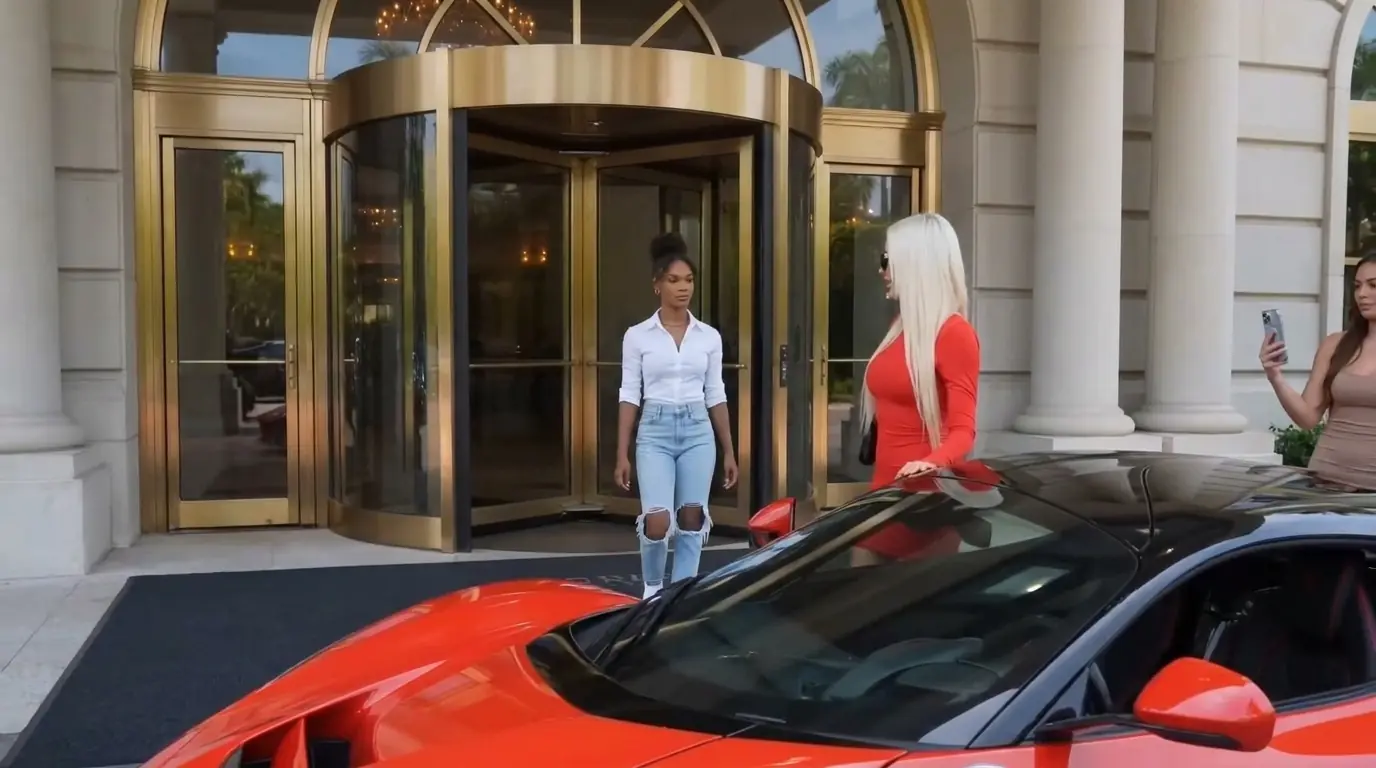 They Laughed at the Black Woman Beside the Ferrari—Then One Click of Her Key Fob Changed the Entire Hotel Entrance