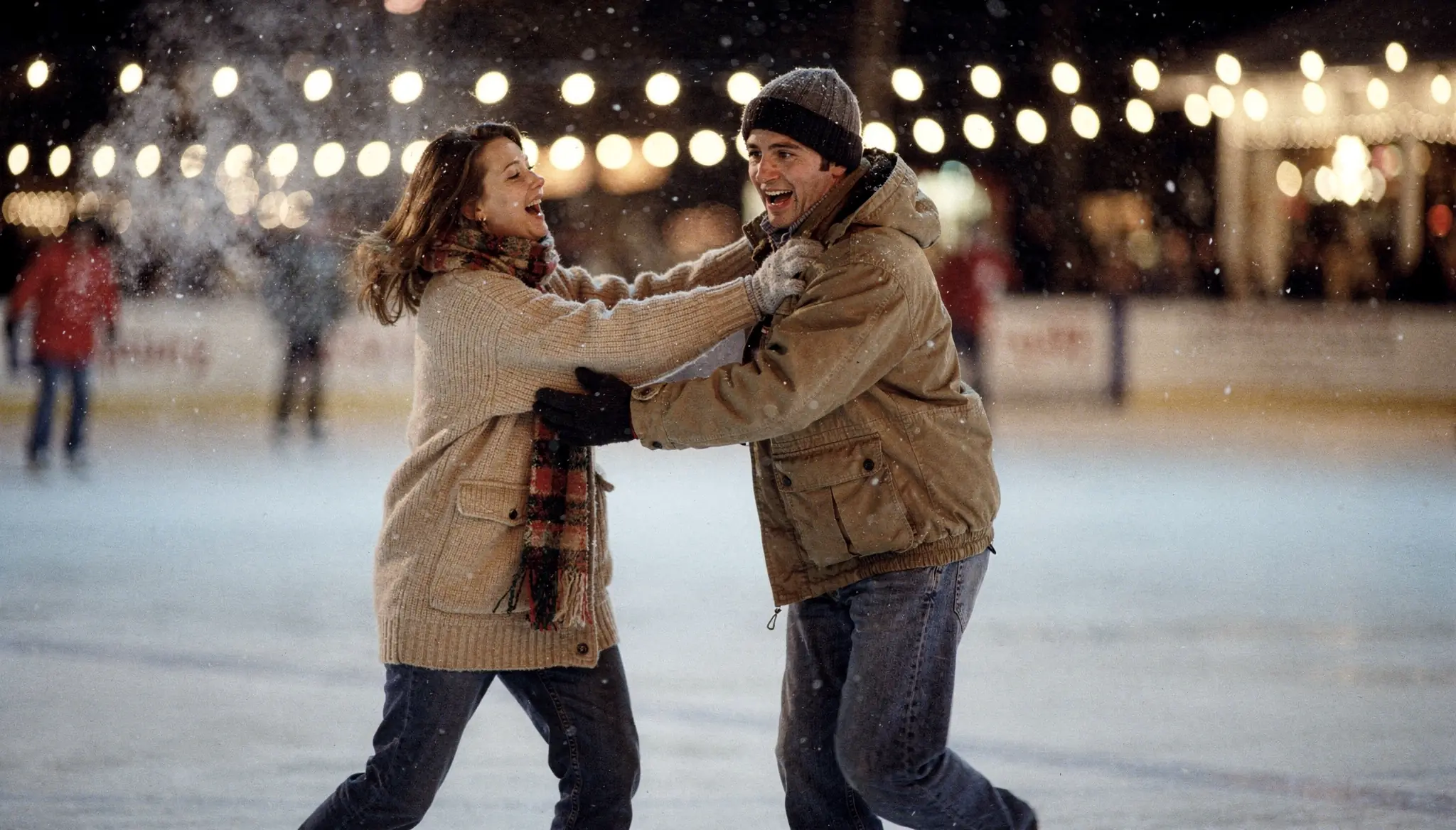 She Caught Him Before He Fell Under the String Lights — Then the Photograph Asked Them Both to Stay