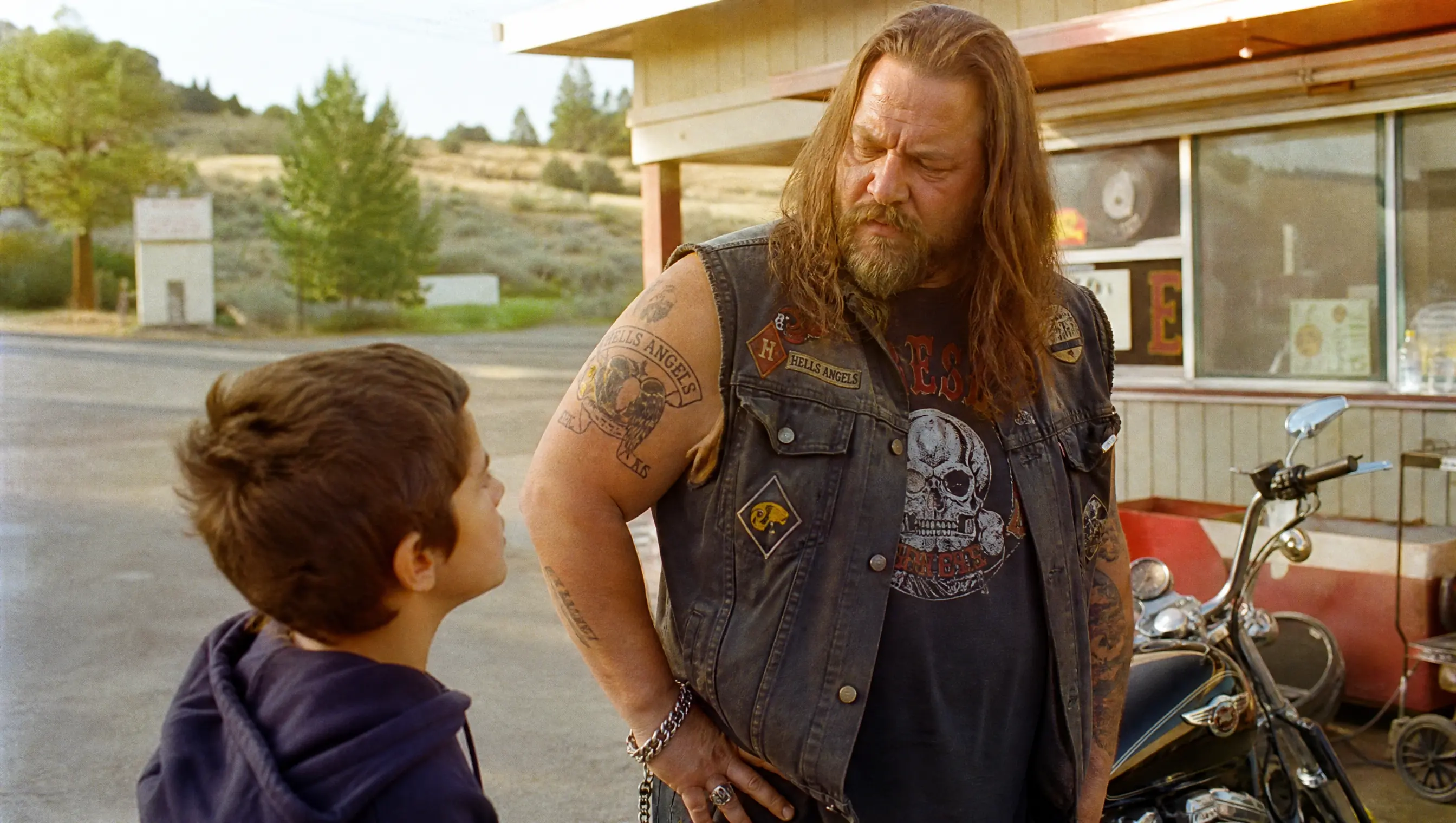 "The Two Men Who Followed Your Motorcycle Are Outside," the Boy Warned, Until the Hells Angel's Asked, "Did They See You Come Inside?"